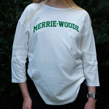 Load image into Gallery viewer, Blonde girl wearing a white, 3/4 sleeve t-shirt that says "Merrie-Woode" across the chest in green lettering.