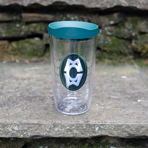 Clear Tervis tumbler with a green lid featuring the Camp Merrie-Woode oval logo, which has the initials 