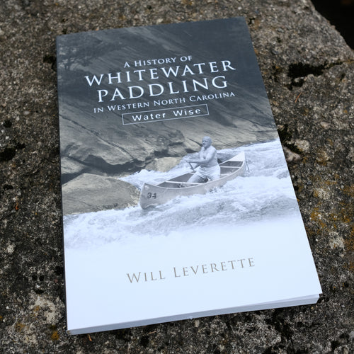 Book titled A History of Whitewater Paddling in Western North Carolina: Water Wise by Will Leverette. Cover shows a man canoeing down white water, next to a slab rock.