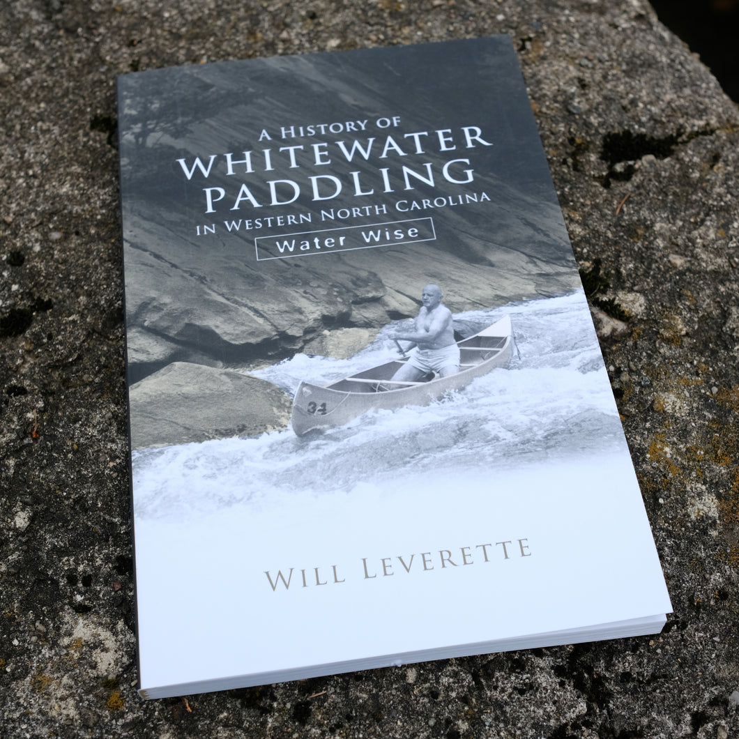 Book titled A History of Whitewater Paddling in Western North Carolina: Water Wise by Will Leverette. Cover shows a man canoeing down white water, next to a slab rock.